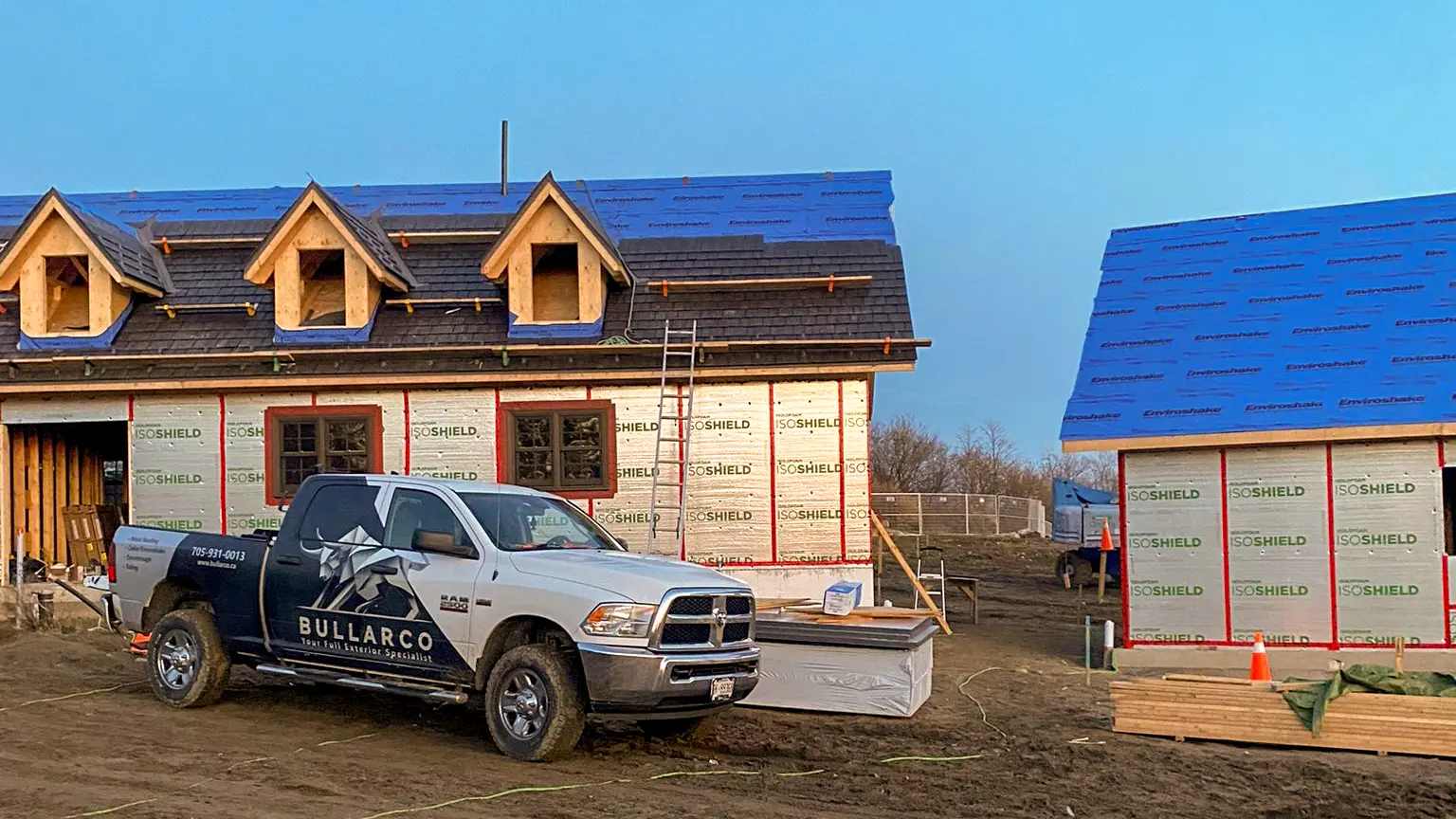 Bullarco branded truck parked at an Enviroshake roofing jobsite in the Kawarthas
