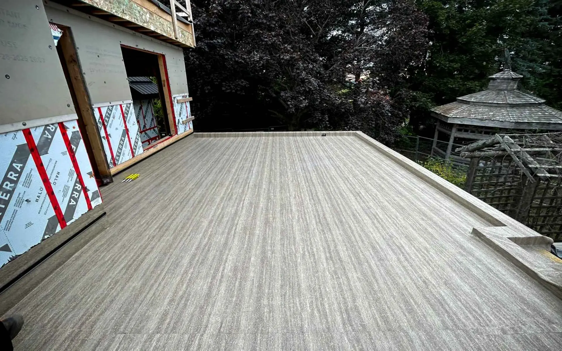 Duradek waterproof vinyl decking installed by Bullarco